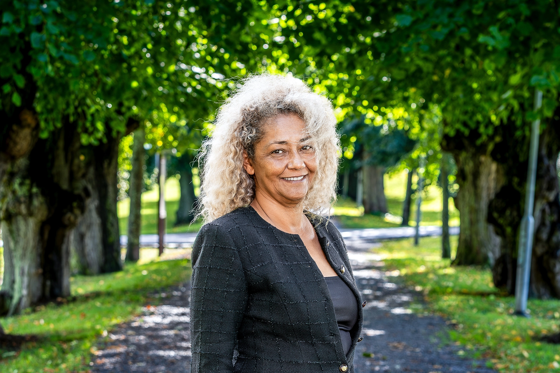 Kvinna som representerar lokalvård i sydsverige.